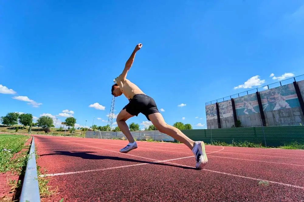 Sprinter starting a race on outdoor track
